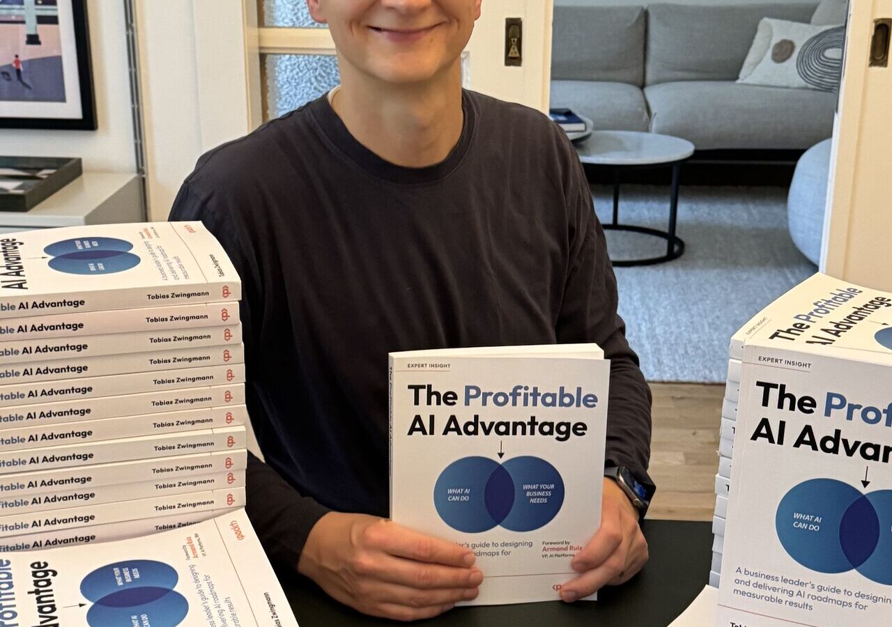 Tobias Zwingmann with copies of The Profitable AI Advantage